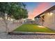 Landscaped backyard with artificial turf and gravel at 103 W Tanya Rd, Phoenix, AZ 85086