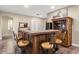 Rustic wooden bar with leather stools, perfect for entertaining at 103 W Tanya Rd, Phoenix, AZ 85086