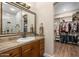 Elegant bathroom features a large vanity, walk-in closet and shower at 103 W Tanya Rd, Phoenix, AZ 85086