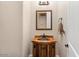 Rustic bathroom with wood vanity and a unique sink at 103 W Tanya Rd, Phoenix, AZ 85086