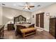 Main bedroom with rustic wood furniture and ceiling fan at 103 W Tanya Rd, Phoenix, AZ 85086