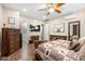 Serene bedroom with a king-size bed and access to ensuite bathroom at 103 W Tanya Rd, Phoenix, AZ 85086