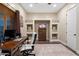 Bright home office features built-in shelves and hardwood floors at 103 W Tanya Rd, Phoenix, AZ 85086