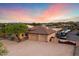 Beautiful house exterior with three-car garage and desert landscaping at 103 W Tanya Rd, Phoenix, AZ 85086