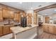 Modern kitchen with stainless steel appliances and brick backsplash at 103 W Tanya Rd, Phoenix, AZ 85086