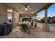 Covered patio with dining area and built-in grill at 103 W Tanya Rd, Phoenix, AZ 85086