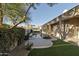 Inviting backyard oasis featuring a sparkling pool and lush landscaping at 10360 N 110Th Pl, Scottsdale, AZ 85259