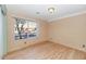 Spacious bedroom with wood floors and natural light at 10927 E Cholla Rd, Mesa, AZ 85207