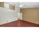 Well-lit bedroom with wood floors and large closet at 10927 E Cholla Rd, Mesa, AZ 85207