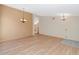 Dining room with hardwood floors and neutral paint at 10927 E Cholla Rd, Mesa, AZ 85207