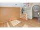 Living room with hardwood floors, neutral walls, and a half wall at 10927 E Cholla Rd, Mesa, AZ 85207