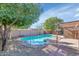 Inviting kidney-shaped pool in backyard oasis at 10927 E Cholla Rd, Mesa, AZ 85207