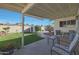 Landscaped backyard with patio, shed, and grassy area at 11453 N 24Th Dr, Phoenix, AZ 85029