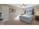 Comfortable bedroom with a queen-size bed and window at 11453 N 24Th Dr, Phoenix, AZ 85029