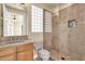 Bathroom with walk-in shower and wood vanity at 11729 N 134Th St, Scottsdale, AZ 85259