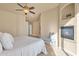 Main bedroom with fireplace and tiled floors at 11729 N 134Th St, Scottsdale, AZ 85259