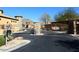 Gated community entrance with stone pillars and iron gates at 11729 N 134Th St, Scottsdale, AZ 85259