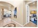 Bright hallway with access to home office and living areas at 11729 N 134Th St, Scottsdale, AZ 85259