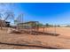 Sunset Park features a baseball field with dugouts and bleachers at 12815 W Milton Dr, Peoria, AZ 85383