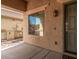 Covered porch with keypad entry and exterior lighting at 12815 W Milton Dr, Peoria, AZ 85383