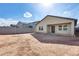 Large backyard with block wall and a covered patio at 12958 E Larrea Ln, Florence, AZ 85132