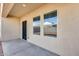 Covered patio with two windows at 12958 E Larrea Ln, Florence, AZ 85132