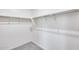 Large walk-in closet with shelving at 12958 E Larrea Ln, Florence, AZ 85132