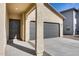 Two car garage with attached entryway at 12958 E Larrea Ln, Florence, AZ 85132