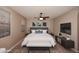 Main bedroom with ceiling fan and TV at 13450 E Via Linda -- # 1010, Scottsdale, AZ 85259