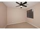 Well-lit bedroom with neutral walls, ceiling fan, and carpet at 13450 E Via Linda -- # 1010, Scottsdale, AZ 85259