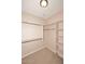 Walk-in closet with shelves and hanging rods at 13450 E Via Linda -- # 1010, Scottsdale, AZ 85259