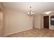 Dining room with tile floors and a chandelier at 13450 E Via Linda -- # 1010, Scottsdale, AZ 85259