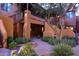 Spanish style building with walkway and landscaping at 13450 E Via Linda -- # 1010, Scottsdale, AZ 85259