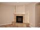 Corner fireplace with tile surround in a neutral-toned room at 13450 E Via Linda -- # 1010, Scottsdale, AZ 85259