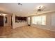 Spacious living area featuring tile floors and a ceiling fan at 13450 E Via Linda -- # 1010, Scottsdale, AZ 85259