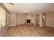 Living area with tile floors, fireplace, and ceiling fan at 13450 E Via Linda -- # 1010, Scottsdale, AZ 85259