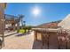 Landscaped backyard with pool and outdoor kitchen at 14422 S 24Th Pl, Phoenix, AZ 85048