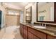 Clean bathroom with double vanity and granite countertop at 14422 S 24Th Pl, Phoenix, AZ 85048