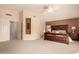 Spacious Primary bedroom with large bed and ensuite bathroom access at 14422 S 24Th Pl, Phoenix, AZ 85048