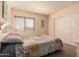 Cozy bedroom with double bed and built-in shelving at 14422 S 24Th Pl, Phoenix, AZ 85048