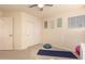 Bedroom with exercise ball, yoga mat, and storage at 14422 S 24Th Pl, Phoenix, AZ 85048