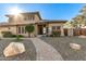 Two-story house with a brick walkway and desert landscaping at 14422 S 24Th Pl, Phoenix, AZ 85048