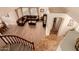 Upstairs view of living room with L-shaped sectional sofa and hardwood floors at 14422 S 24Th Pl, Phoenix, AZ 85048