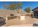 Outdoor kitchen with grill and stone countertops at 14422 S 24Th Pl, Phoenix, AZ 85048