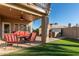 Covered patio with seating and a hot tub at 14422 S 24Th Pl, Phoenix, AZ 85048