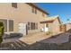 Brick pathway leads to a side entrance with AC unit and storage at 14422 S 24Th Pl, Phoenix, AZ 85048