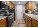 Modern kitchen with stainless steel appliances and wood cabinets at 14645 N Fountain Hills Blvd # 205, Fountain Hills, AZ 85268