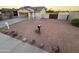 Single-story house with a small front yard and gravel landscaping at 16008 N Hollyhock St, Surprise, AZ 85378