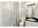 Clean bathroom with shower/tub combo, updated vanity, and patterned shower curtain at 16410 S 12Th St # 206, Phoenix, AZ 85048