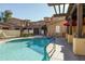 Community pool with spa and surrounding patio area at 16410 S 12Th St # 206, Phoenix, AZ 85048